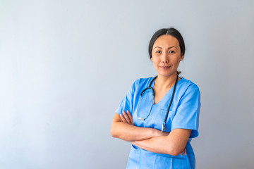 Smiling medical worker portrait. Nurse portrait smiling in a hospital hallway. Portrait of a...