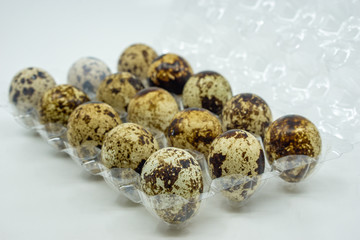 Quail eggs isolated on white background.Selective focus.