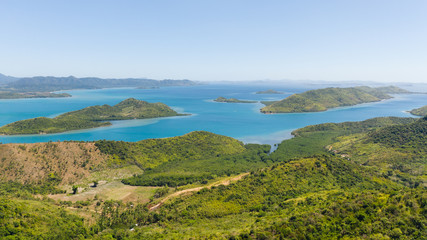 Fototapeta premium Green tropical islands and azure sea.A group of islands of the Malay Archipelago. El Nido,Palawan,Philippines