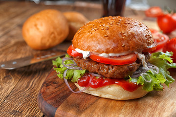 homemade burger on a wooden table