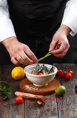 preparing soup with sea food