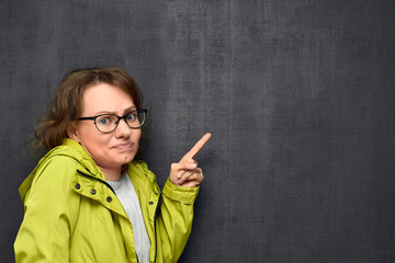 Portrait of girl pointing at something terrible