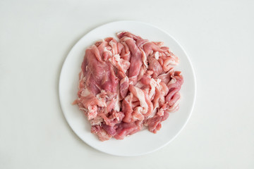 白背景に料理の具材の生の豚肉