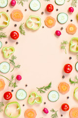 Salad ingredients layout. Food pattern with cherry tomatoes, carrot, cucumbers, radish, greens, pepper and spices