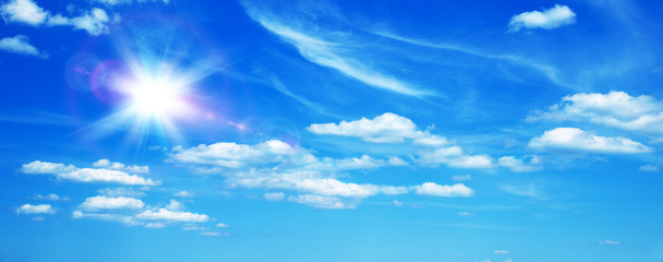 Sunny background with clouds