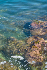                      Stone beach of mediterranian sea, sea coast. Natural background.           