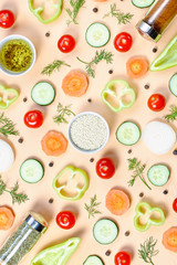 Salad ingredients layout. Food pattern with cherry tomatoes, carrot, cucumbers, radish, greens, pepper and spices
