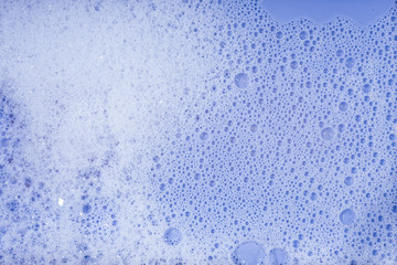 Soap bubbles background- suds liquid