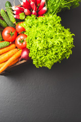 Overhead shot of colorful vegetables in wooden box