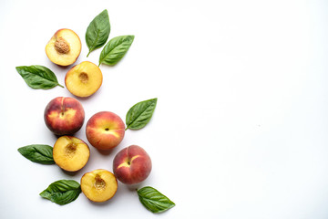 Summertime fruit layout made of sweet ripe peaches on white background. Healthy food, delicious dessert