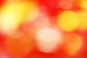 Orange color abstract background with blurred defocus bokeh light