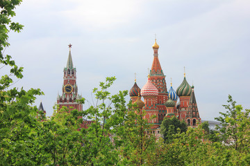 Fototapeta na wymiar Saint Basil Cathedral and Kremlin Spasskaya Tower at the Red Square view from Zaryadye park on summer nature scene in Moscow, Russia