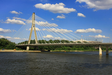 Fototapeta na wymiar Most Świętokrzyski w Warszawie na tle Stadionu Narodowego