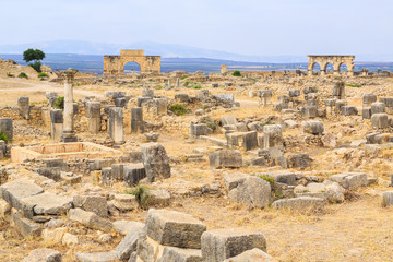 Site overview of the ruins of Volubilis, ancient Roman city in Morocco.