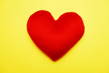 Valentine's day with Red heart Top view on Yellow background