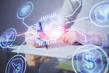 Double exposure of writing hand on background with data technology hologram. Big data concept.