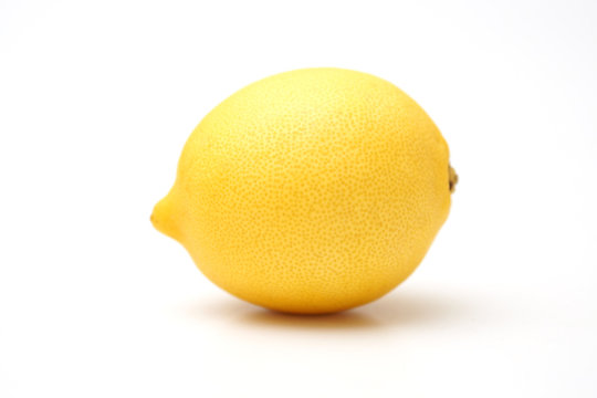 yellow lemon on a completely white background