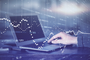 A man working on Laptop with technology theme drawing. Concept of big data. Double exposure.