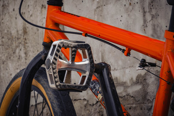 Close up low angle rear view man peddling bike