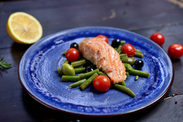 grilled salmon with asparagus, olives and cherry tomatoes