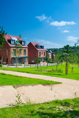 New English Estate with blue sky