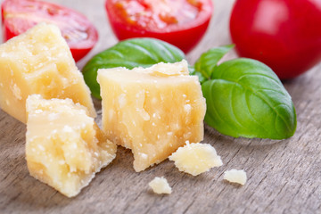 Pieces of Parmesan Reggiano and basil