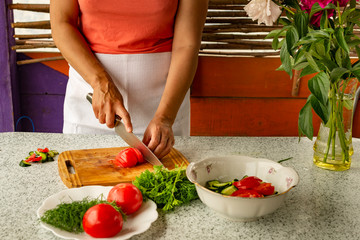 Cooking of organic food. Summer lodge. Fresh air.