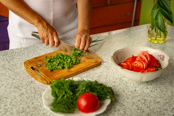 Cooking of organic food. Summer lodge. Fresh air.