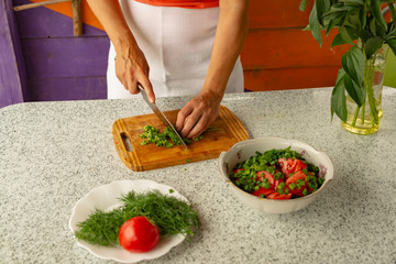 Cooking of organic food. Summer lodge. Fresh air.