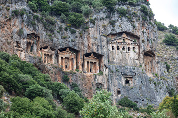 Ancient city of Kaunos, Dalyan valley, Turkey. Kaunos (Latin: Caunus) was a city of ancient Caria and in Anatolia, a few km west of the modern town of Dalyan, Muğla Province, Turkey.