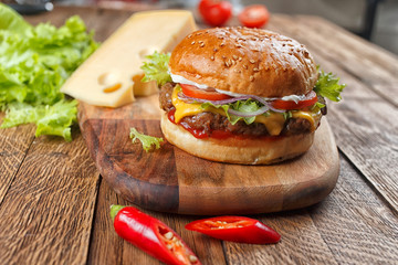 homemade burger on a wooden table