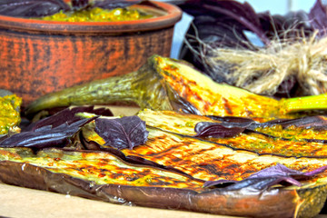 Eggplants with grilled pesto and blue basil. Keto lunch idea. Keto diet. Vegetarian aubergines grilled.