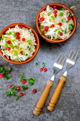 Sauerkraut. Fermented products for health. Sauerkraut with cranberries and spring onions. Probiotics.