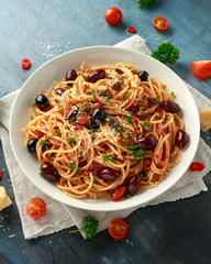 Pasta Alla Puttanesca with garlic, olives, capers, tomato and anchois fish