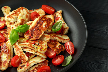 Pan-seared halloumi cheese and sweet cherry tomatoes salad