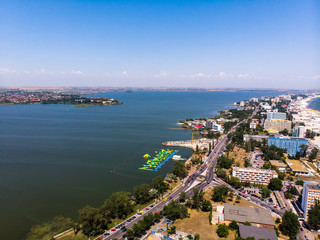 Aerial view of Mamaia in Constanta, popular tourist place and resort on black sea in a Romania. At one side of this place is located lake, and at other side is a Black Sea.