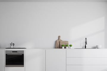 White countertops in white kitchen - obrazy, fototapety, plakaty