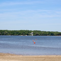 The calm beauty of the lake on a sunny spring day.