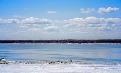 View of the Amur river. Spring - melting ice