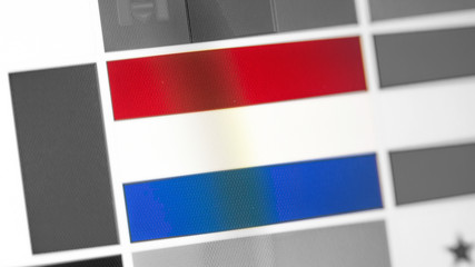 Netherlands national flag of country. Netherlands flag on the display, a digital moire effect.