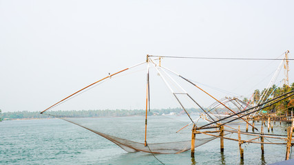 Fototapeta premium traditional Chinese fishing net in kerala kochi ernakulam munambam beach