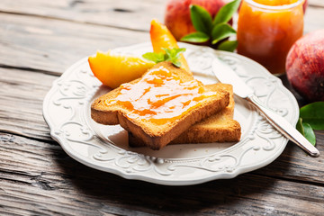 Healthy breakfast with toast and peach jam