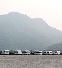Caravan trailer on camping site at mountain.