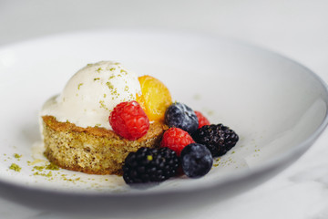 cake with cream and fresh berries