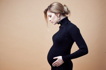 Young beautiful elegant and stylish pregnant woman.