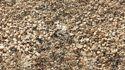 seamless texture of light fine gravel with sand