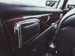 Interior of a stylish vintage car.