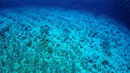 Fototapeta na wymiar Aerial view of Gili island's reefs and corals near Bali, Indonesia