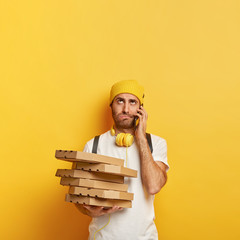 Angry pizza man calls customer via cell phone, being impatient waiting long time for payment,...