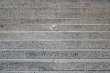 engraving one mile above sea level at the stairs of colorado state capitol